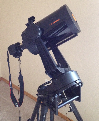 "Celestron C-8 telescope with camera"